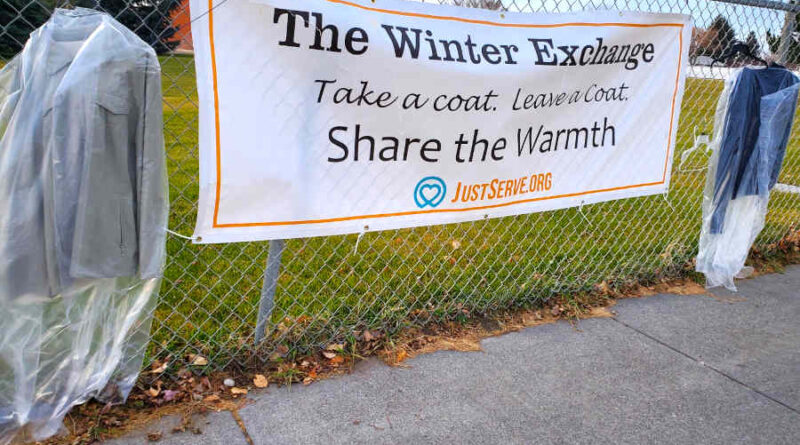 The Winter Exchange banner on a fence