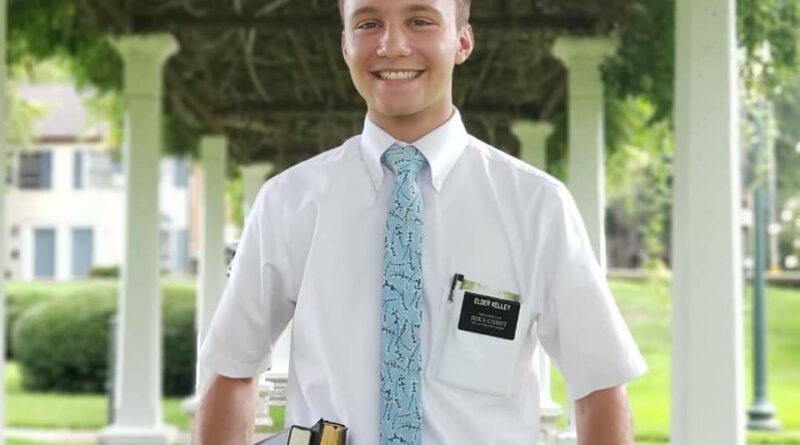 A young man wearing a church uniform