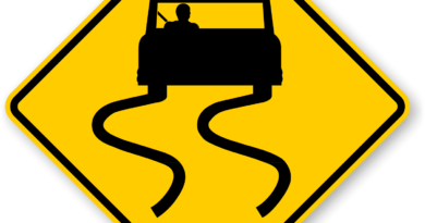 An icy road condition sign