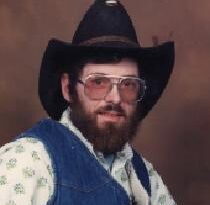 A man wearing a cowboy outfit